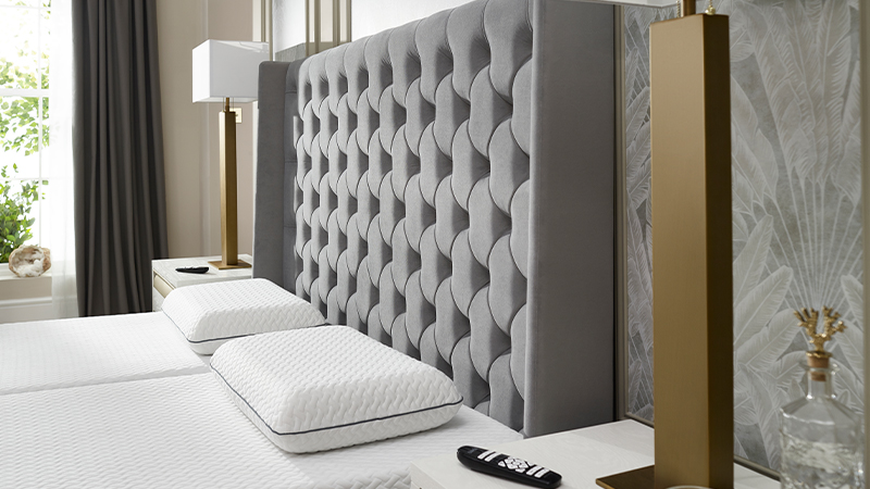 Detail of the Richmond’s deep button-back winged headboard