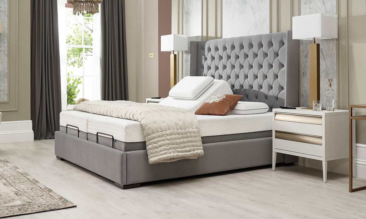 The Richmond electric adjustable bed in grey velvet in an elegant bedroom